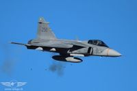 Schussabgabe des JAS-39 aus der 27-mm-Bordkanone Schussabgabe des JAS-39 aus der 27-mm-Bordkanone